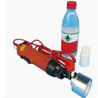 Hand held electric capping machine