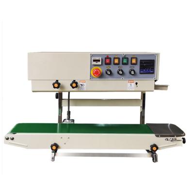 Vertical solid ink band sealer