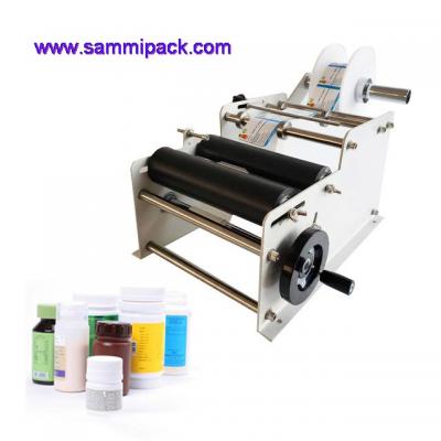 manual round bottle labeling machine